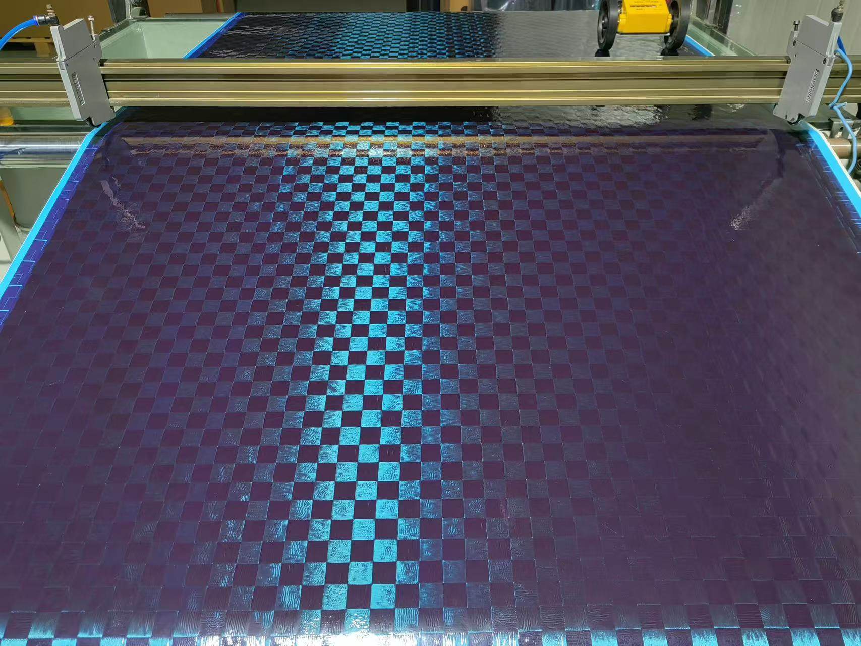 Spread tow carbon fiber prepreg